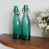 2 old beer bottles