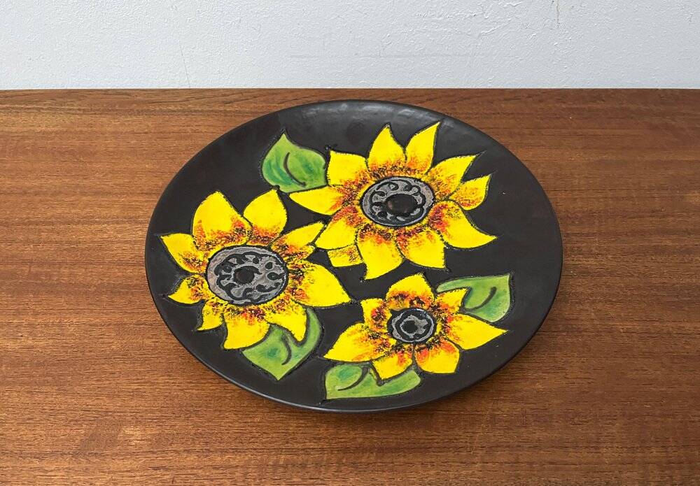 Mid-century German studio pottery wall plate with Ruscha sunflower motif, 1960s.