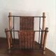 Porte-revues vintage en osier et bois