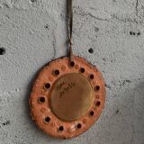 Clay mirror
