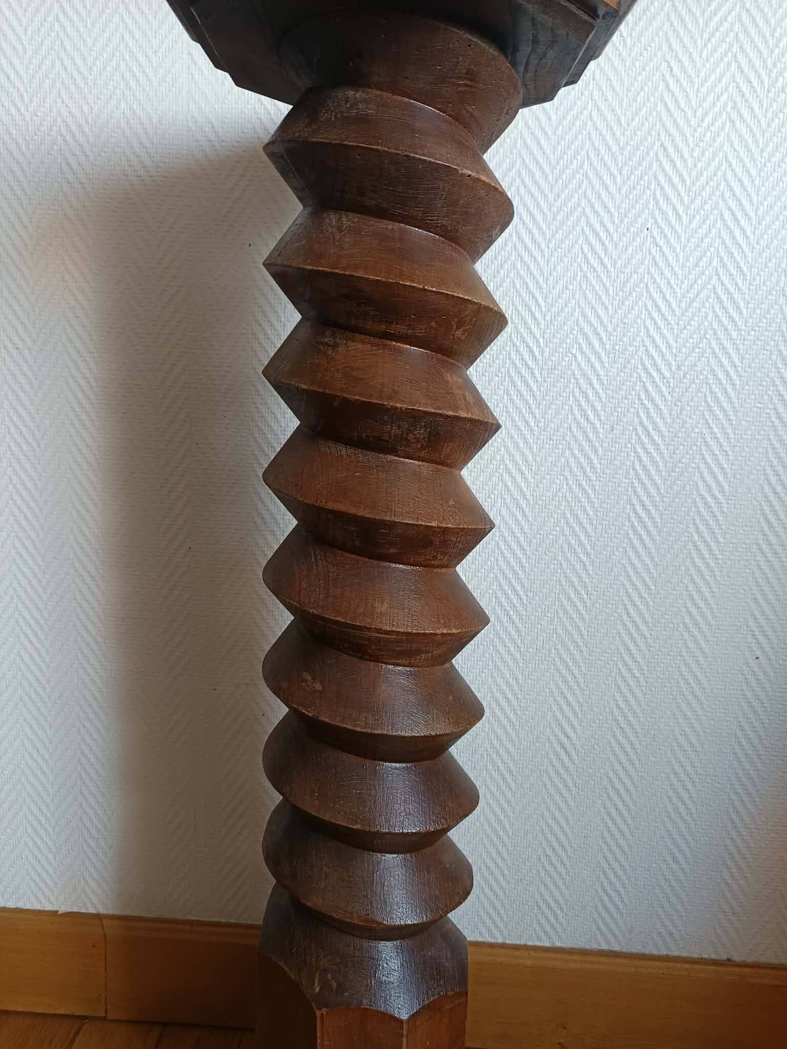 Screw press stool in carved wood
