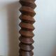 Screw press stool in carved wood