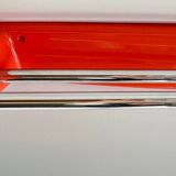 Orange towel rack by Syla from the 70s