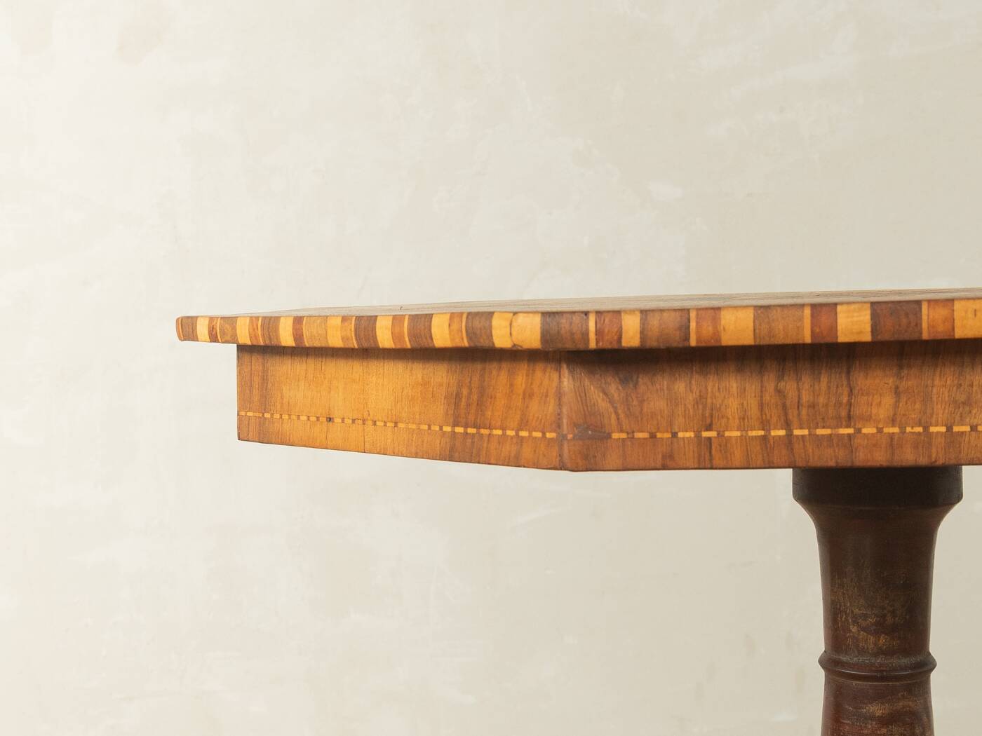 Antique octagonal walnut side table with elaborate inlays, probably Italy, mid-19th century