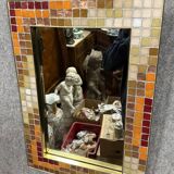 Beautiful vintage mirror in colored ceramic tiles