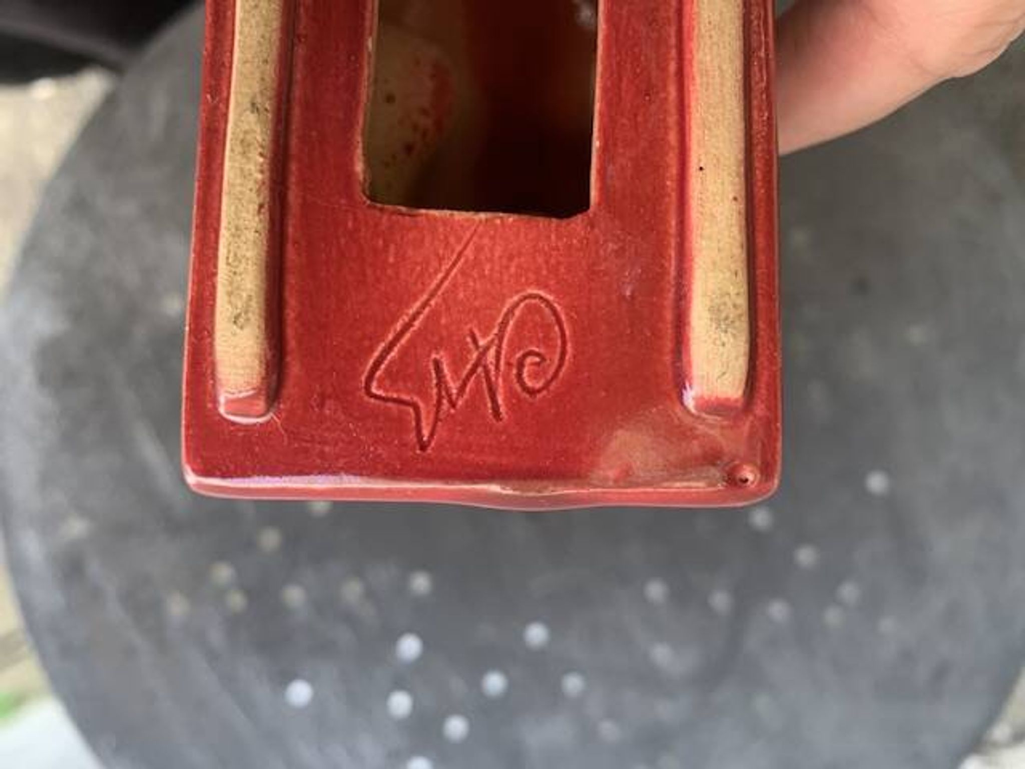 Dog sign CAB in vintage burgundy red enameled ceramic slip, art deco