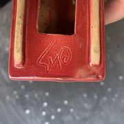 Dog sign CAB in vintage burgundy red enameled ceramic slip, art deco