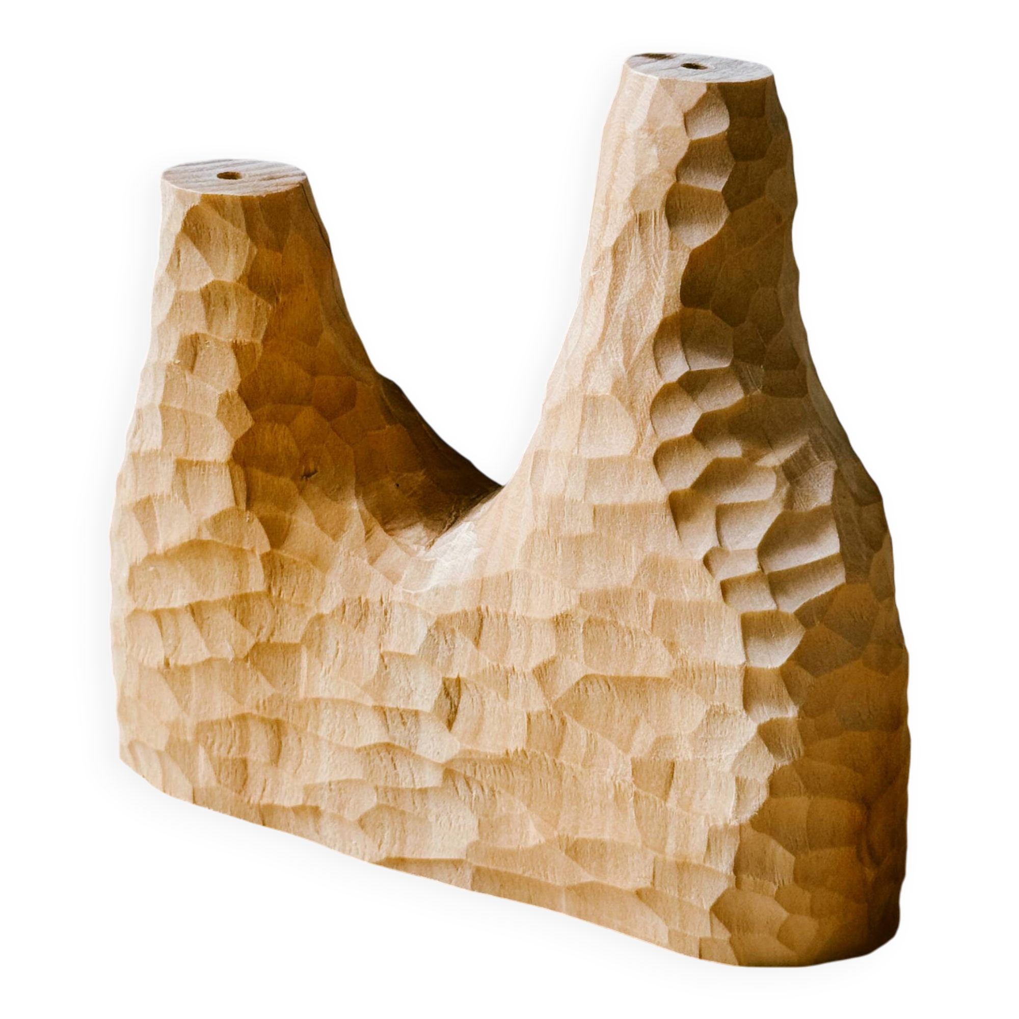 Hand-carved soliflore vase in solid lime wood.
