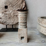Candle holder in light carved wood