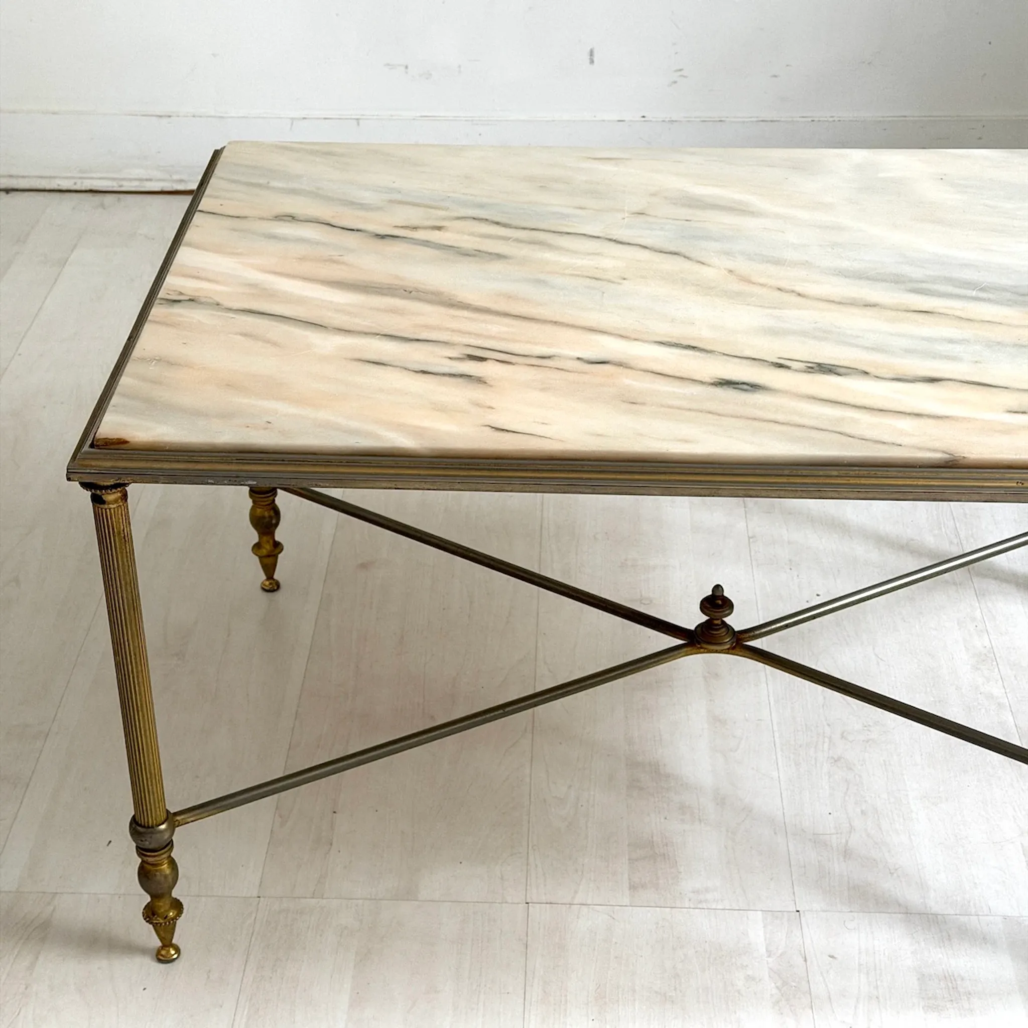 Vintage coffee table in 1970s neoclassical style.