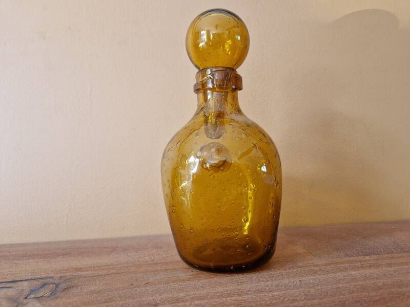 Biot perfume bottle or bubbled glass bottle in amber colour, 1970s design.
