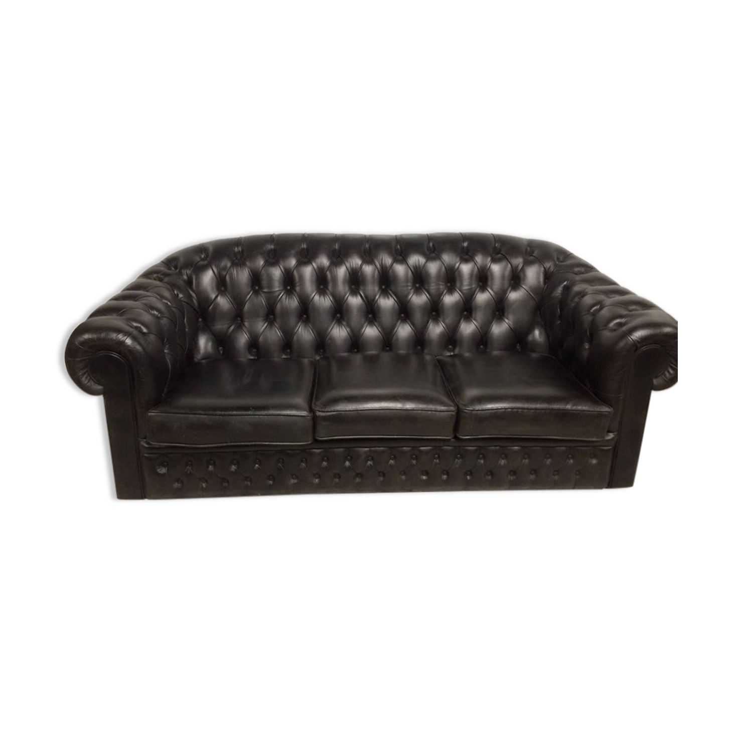 Three-seater black leather chesterfield sofa