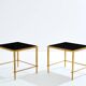 Paire de tables d’appoint fer doré laque noire Maison Ramsay 1950
