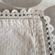 A handmade lace cushion cover