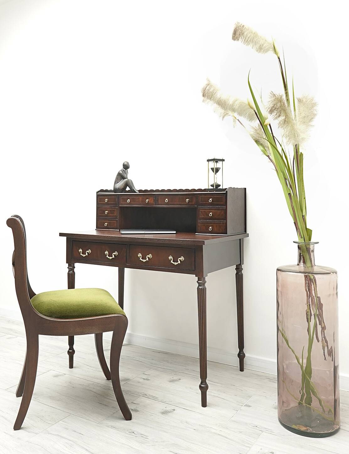 A desk with an English-style chair. After professional renovation.