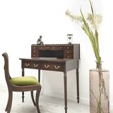A desk with an English-style chair. After professional renovation.
