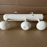 Antique wooden wall-mounted coat rack