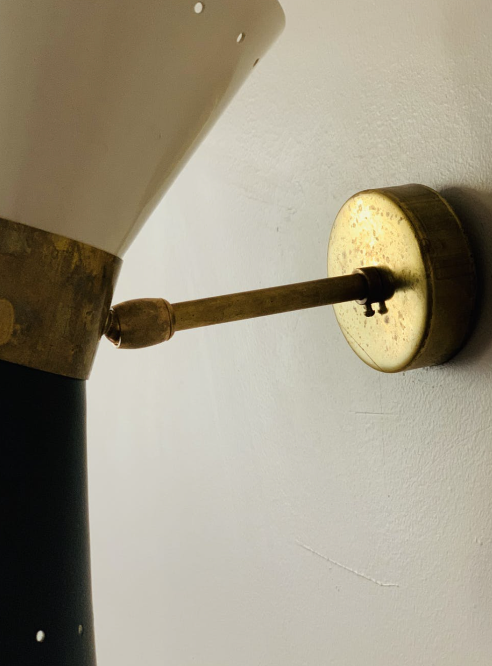 Pair of black Italian diabolo wall lights.