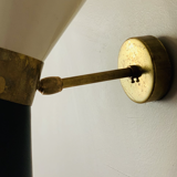 Pair of black Italian diabolo wall lights.