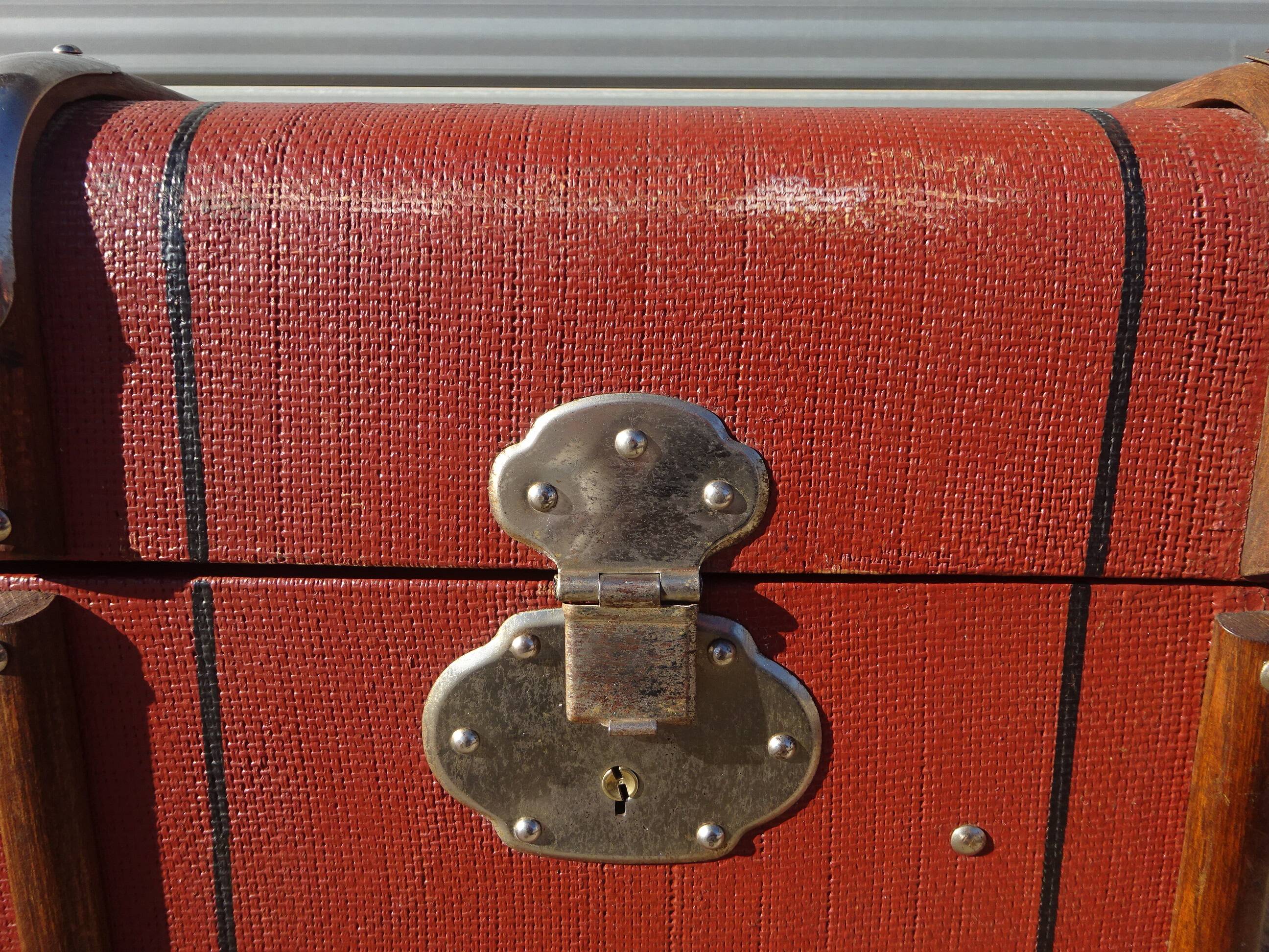 Old curved travel trunk