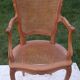 Paire de fauteuils cannés style Louis XV