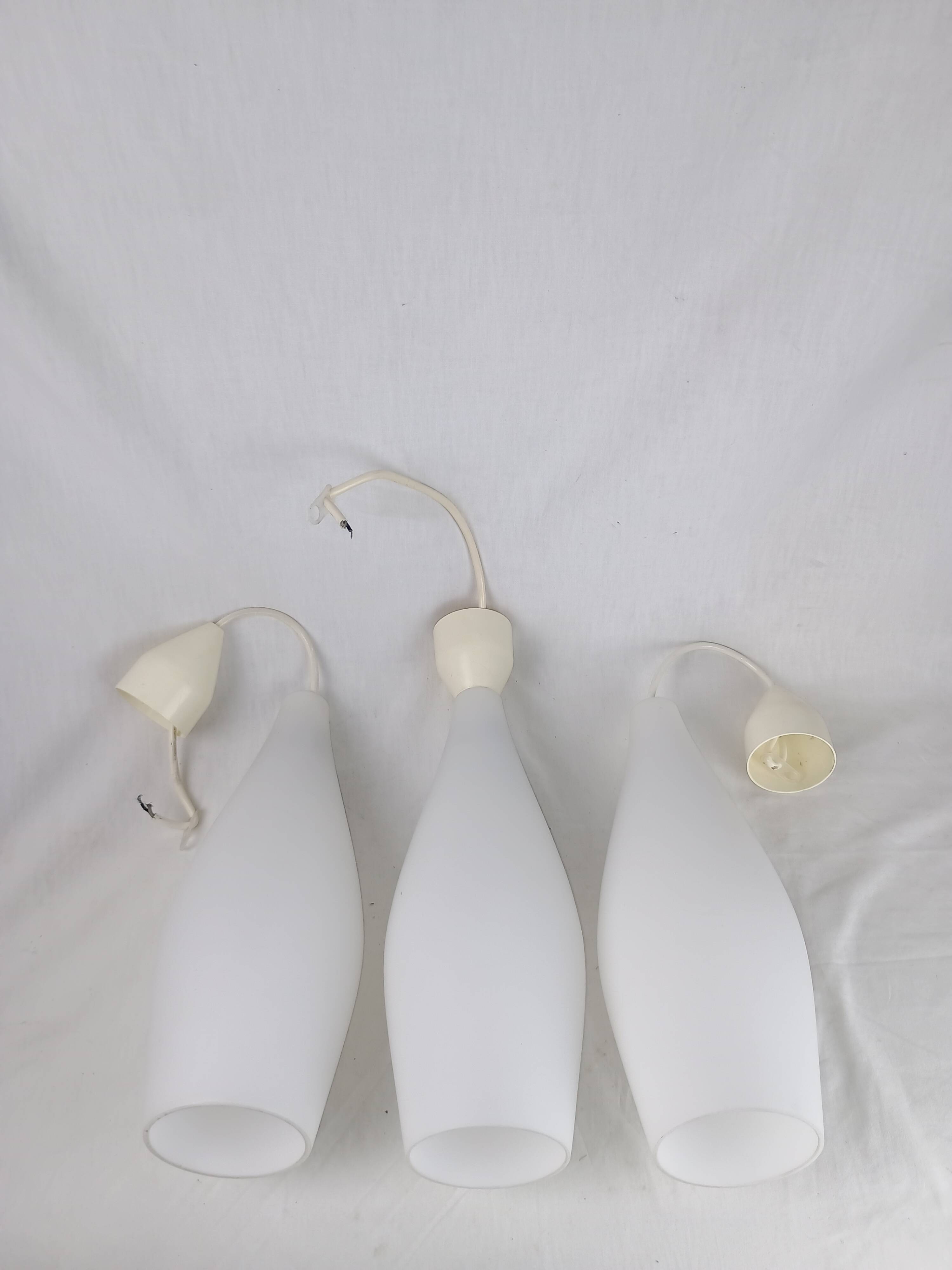 Superb set of three Holmegaard white opaline glass pendant lights
