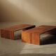 Pair of nesting coffee tables in solid wood, around 1980.