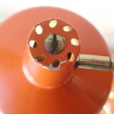 Vintage adjustable lamp, orange, made of metal.