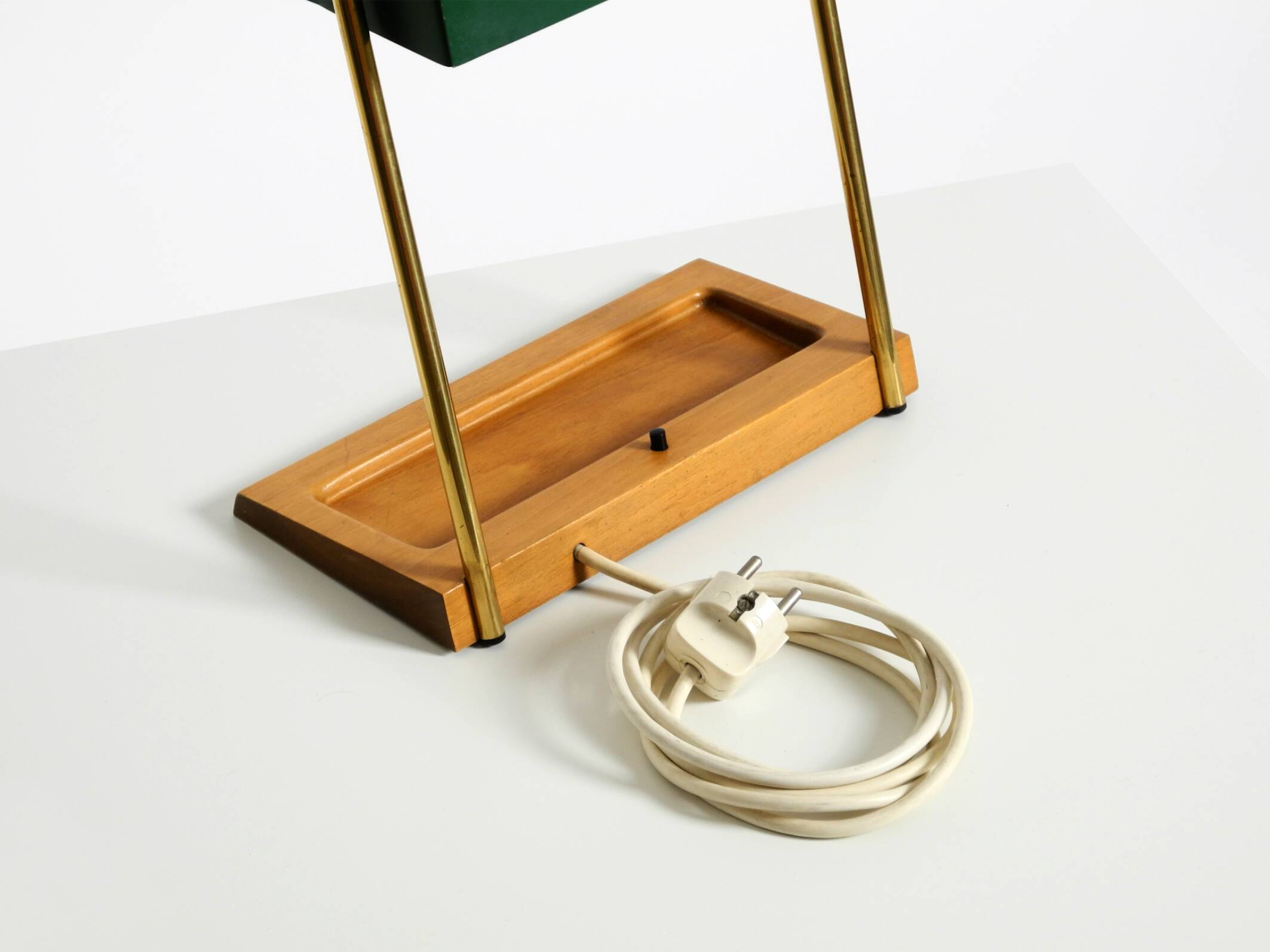 1960s Temde table lamp with a brass frame, teak base, and green lampshade