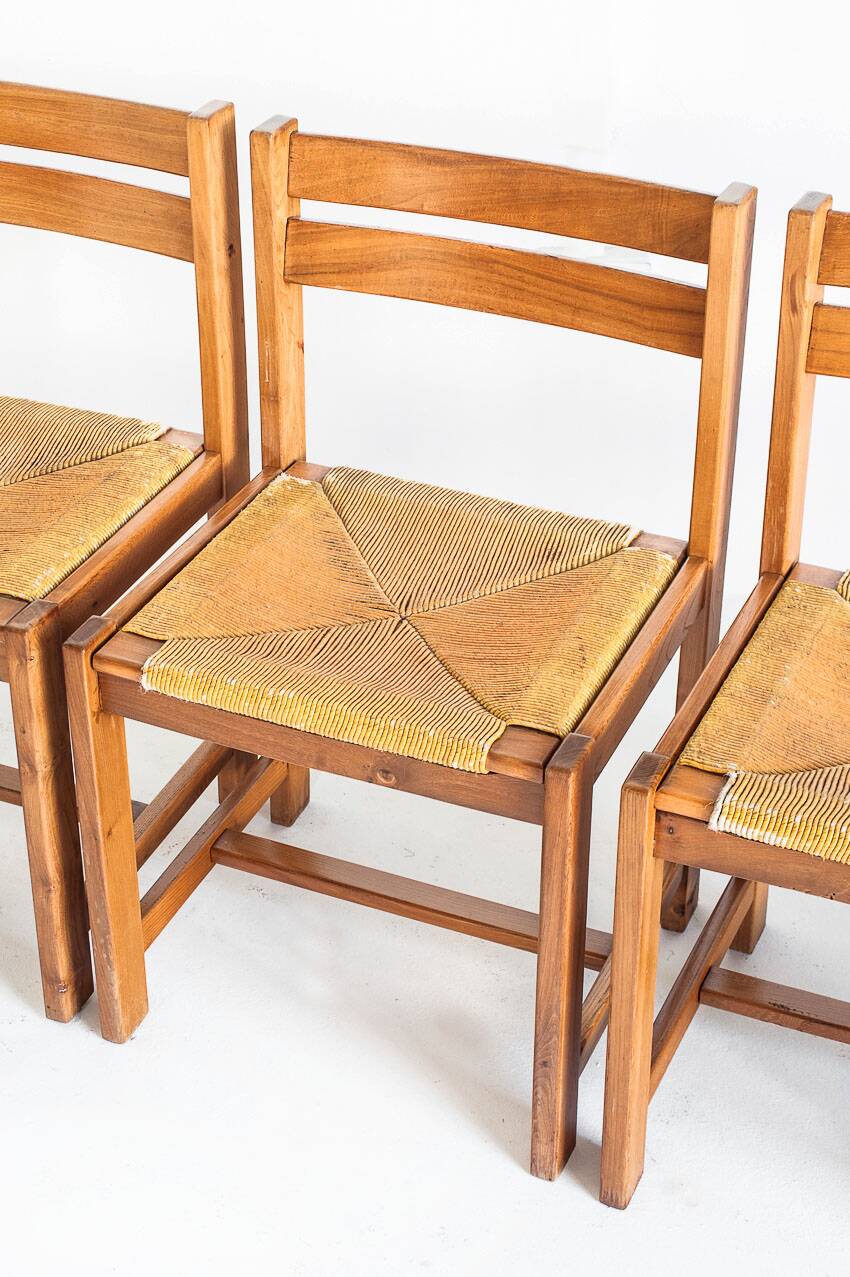 Extendable table and 4 chairs set with a rationalist design in solid elm wood. France, 70's