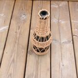 Bottle covered with wicker