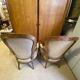 Two Louis XV style wooden and fabric armchairs