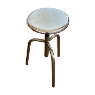Chrome screw stool of hairdresser workshop
