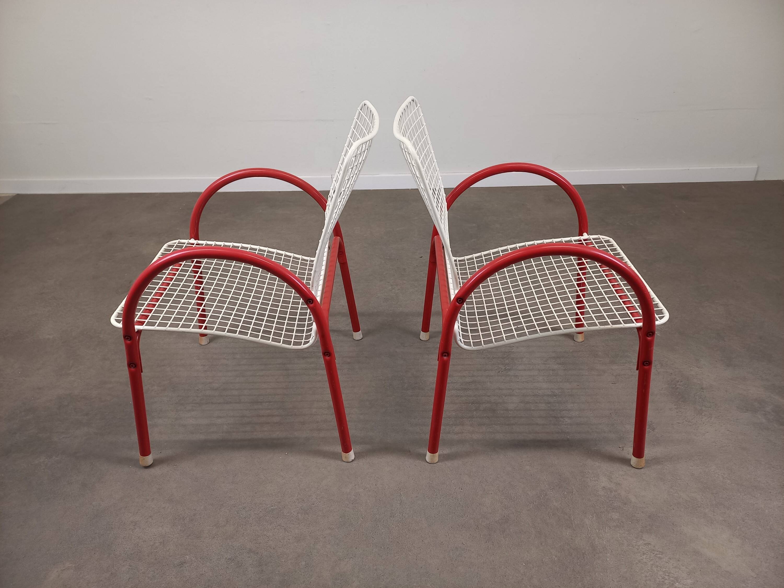 Pair of Emu Rio garden armchairs