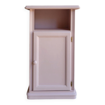 Antique bedside table revamped in pink.