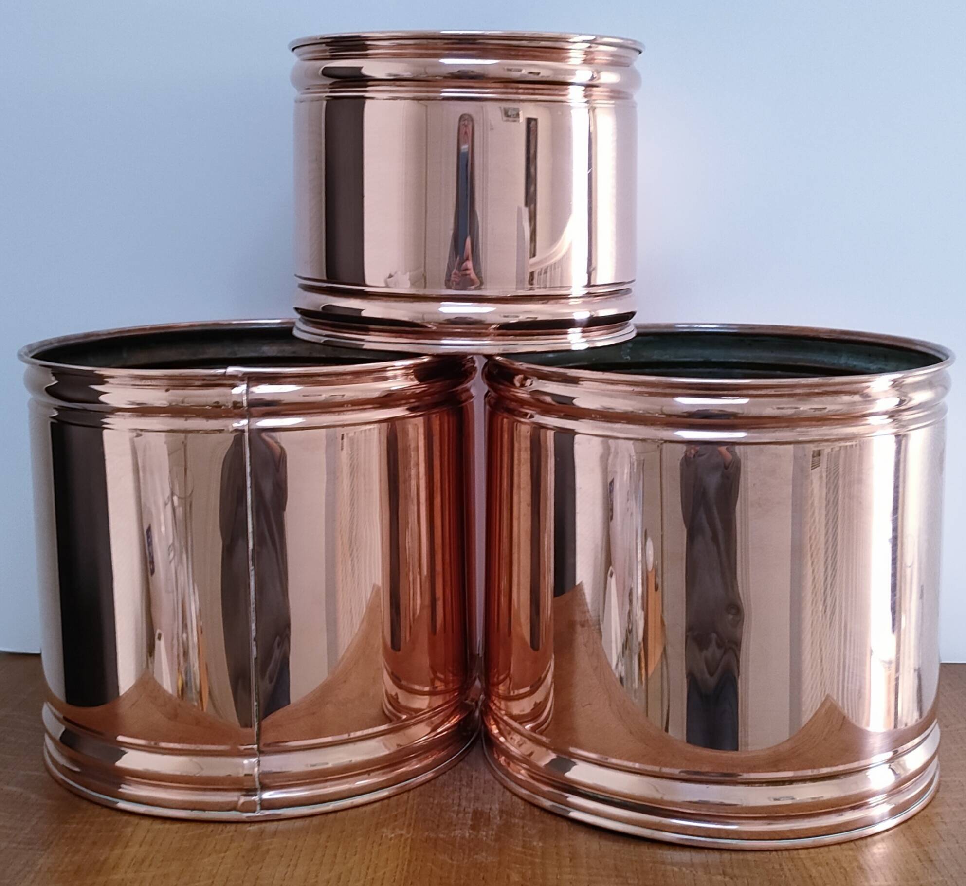 three cylindrical plant pots in a Scandinavian design from the 80s