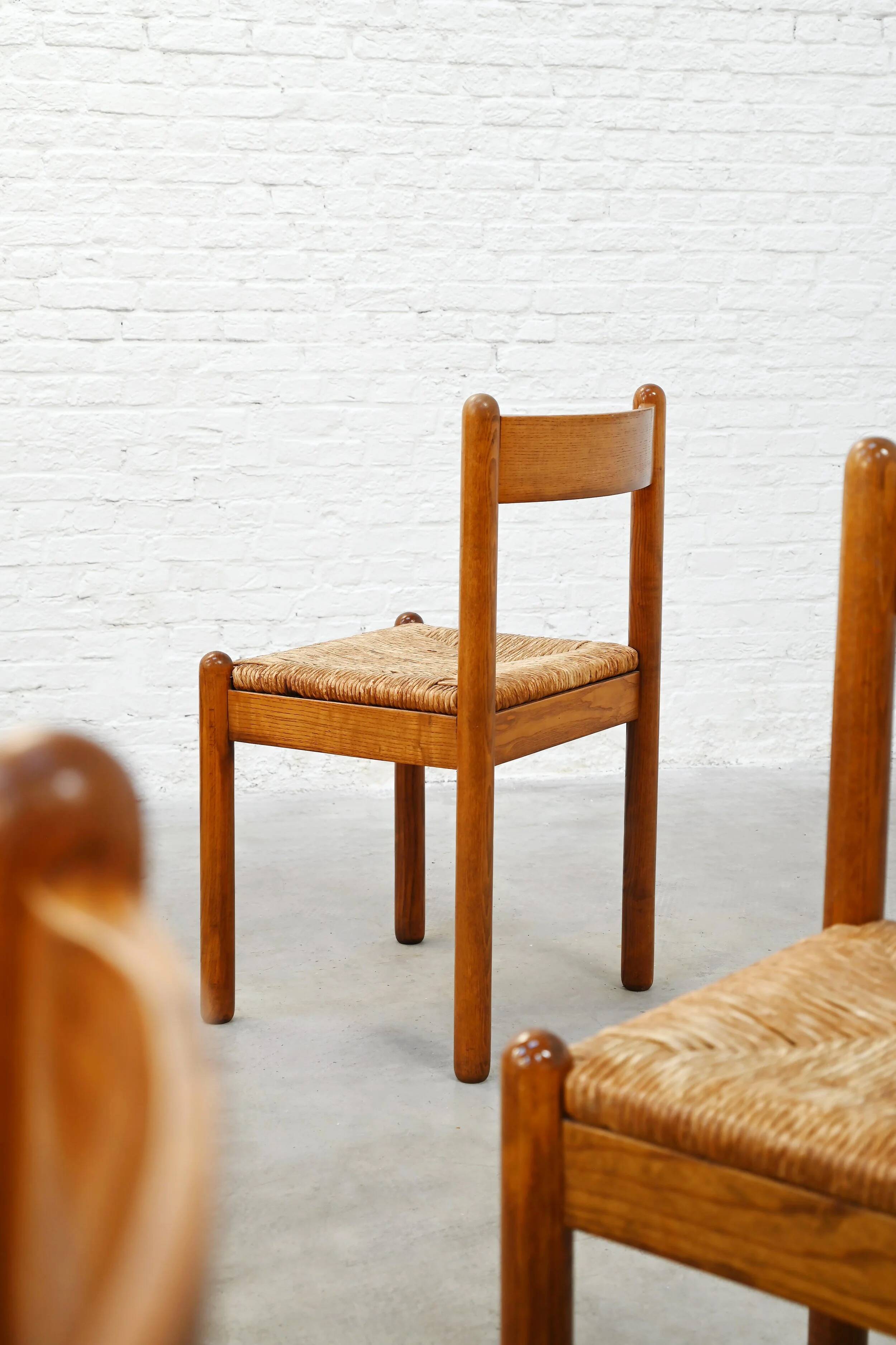 Set of six French oak dining chairs with rush seats, 1970s