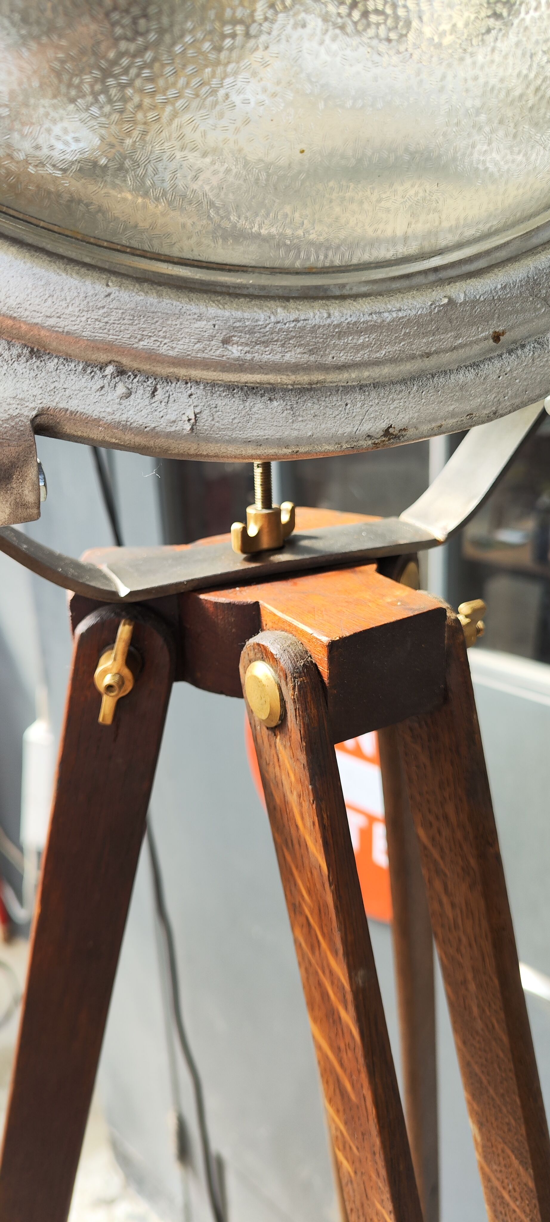 Industrial projector on tripod waxed wood