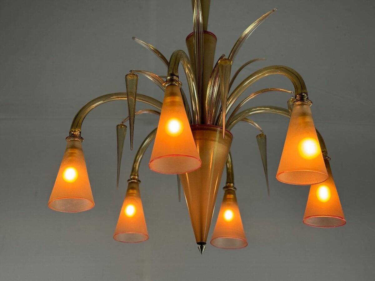 Venetian chandelier in beige/gray murano glass bordered with a red net