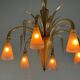 Venetian chandelier in beige/gray murano glass bordered with a red net