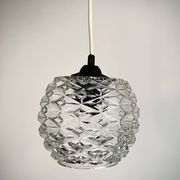 Petit globe pomme de pin transparent
