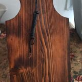 Wall lamp in wrought iron and old wood