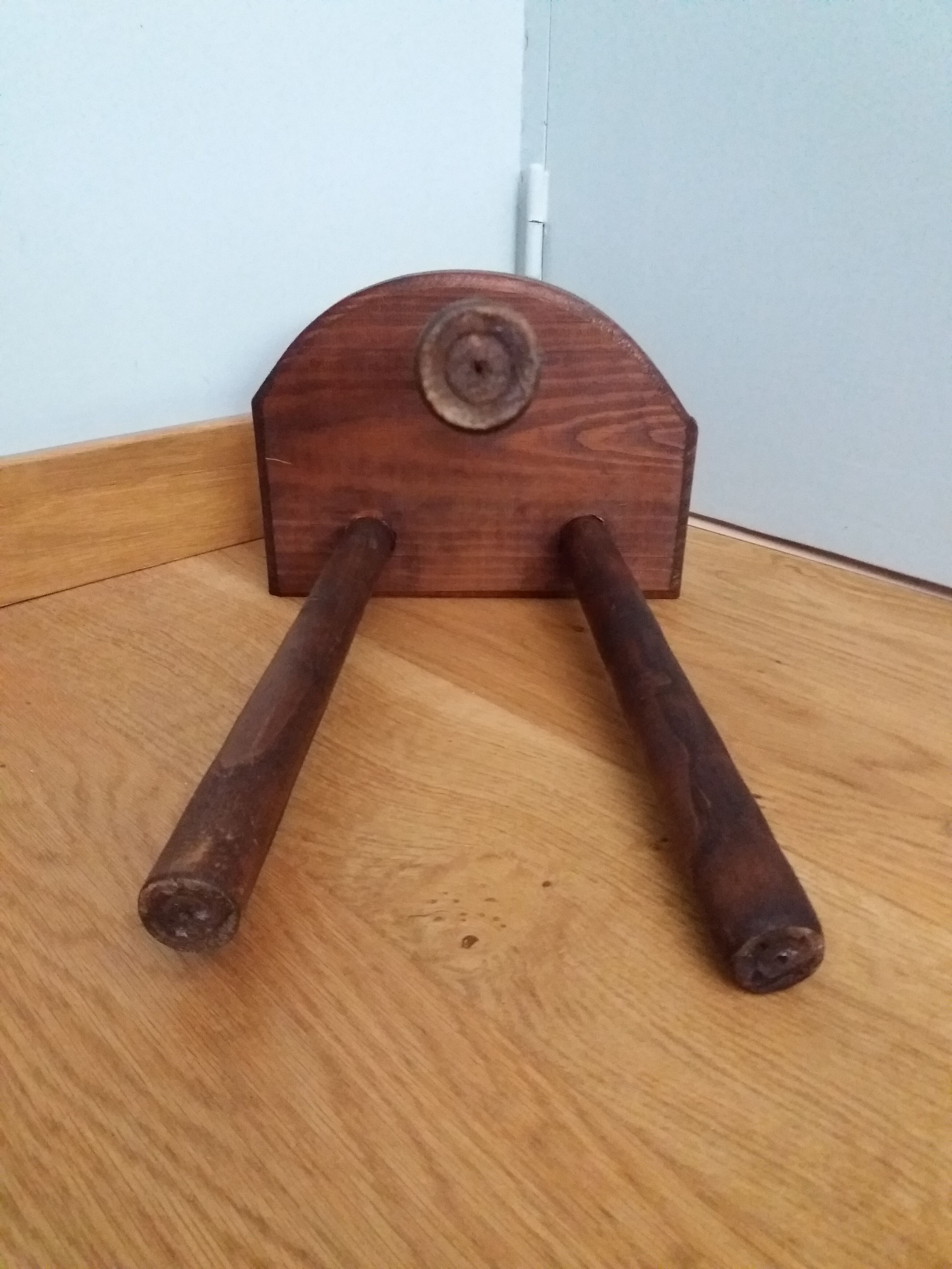 Tripod stool cowherd end of sofa