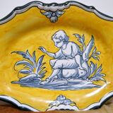 Pair of oval dishes in hand-painted faience with an Italian majolica spirit.