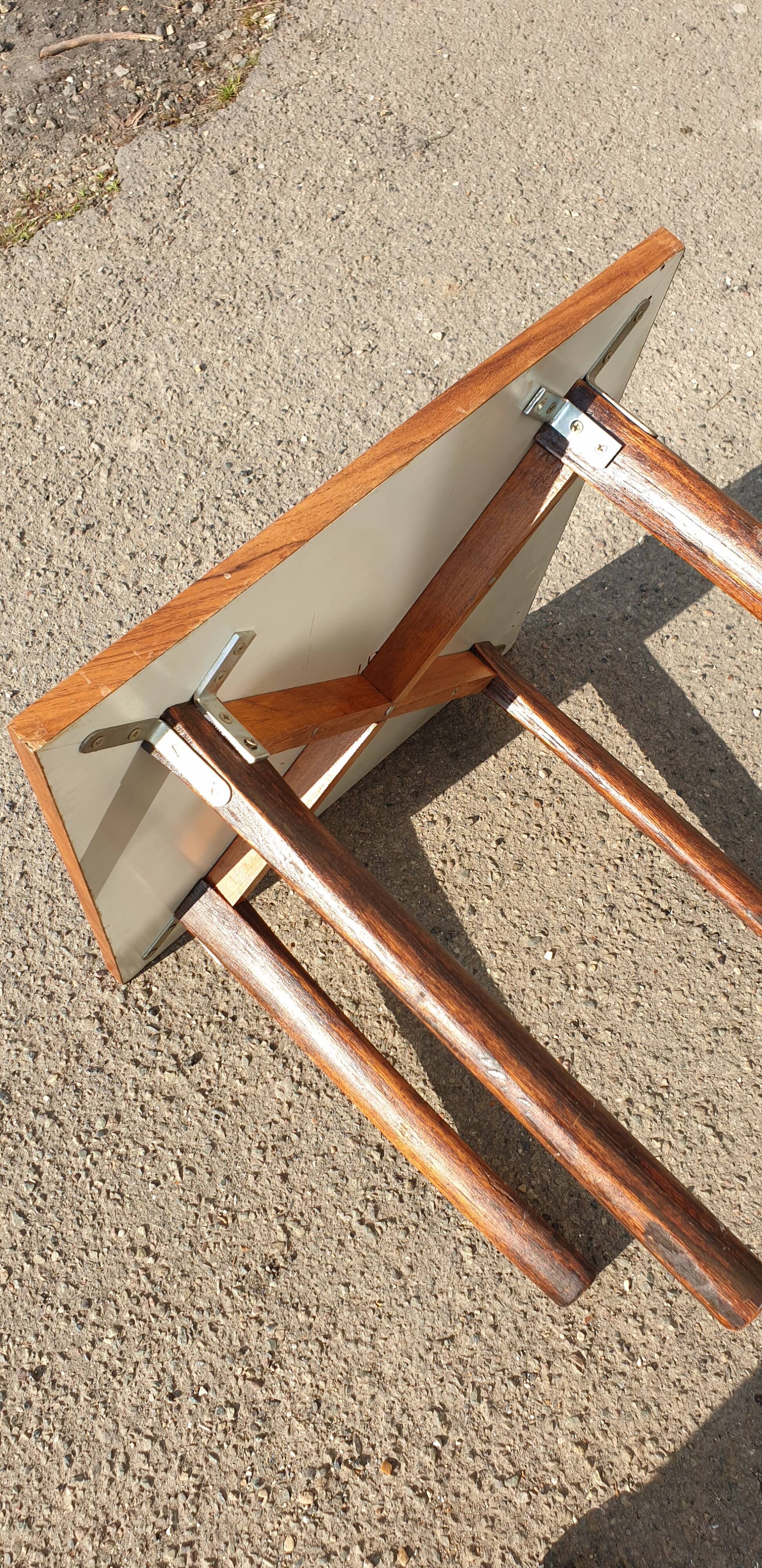 Wooden table with geometric decoration