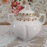 White porcelain sugar bowl decoration in relief and green and gold frieze