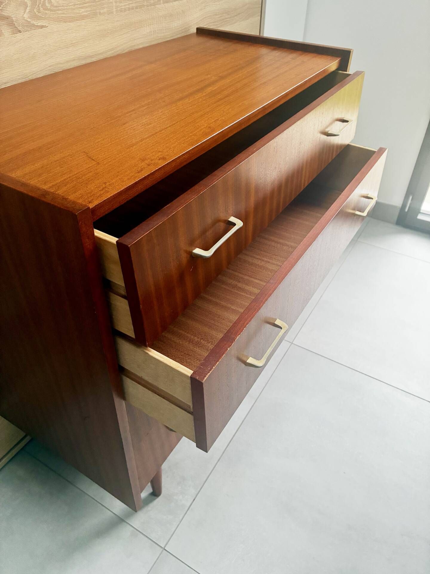 Vintage teak chest of drawers with 4 drawers from the 1960s.