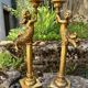 Pair of large candlesticks with cherubs
