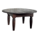 Antique round coffee table in Indonesian teak with turned legs.
