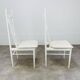 2 Scandinavian slatted chairs, white, from the 1960s.